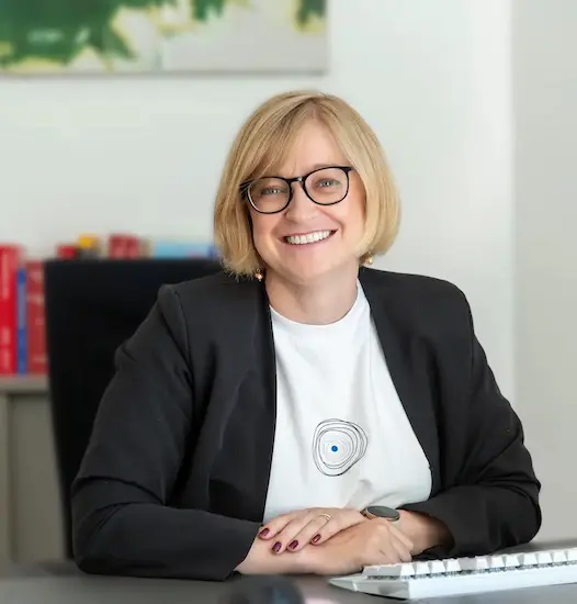 Professional warm headshot of a female lawyer